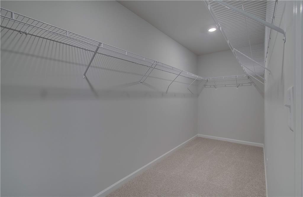 100 Felicity Pike Locust Grove, GA 30248 - Photo 23 of 38 a view of a room with racks on the wall