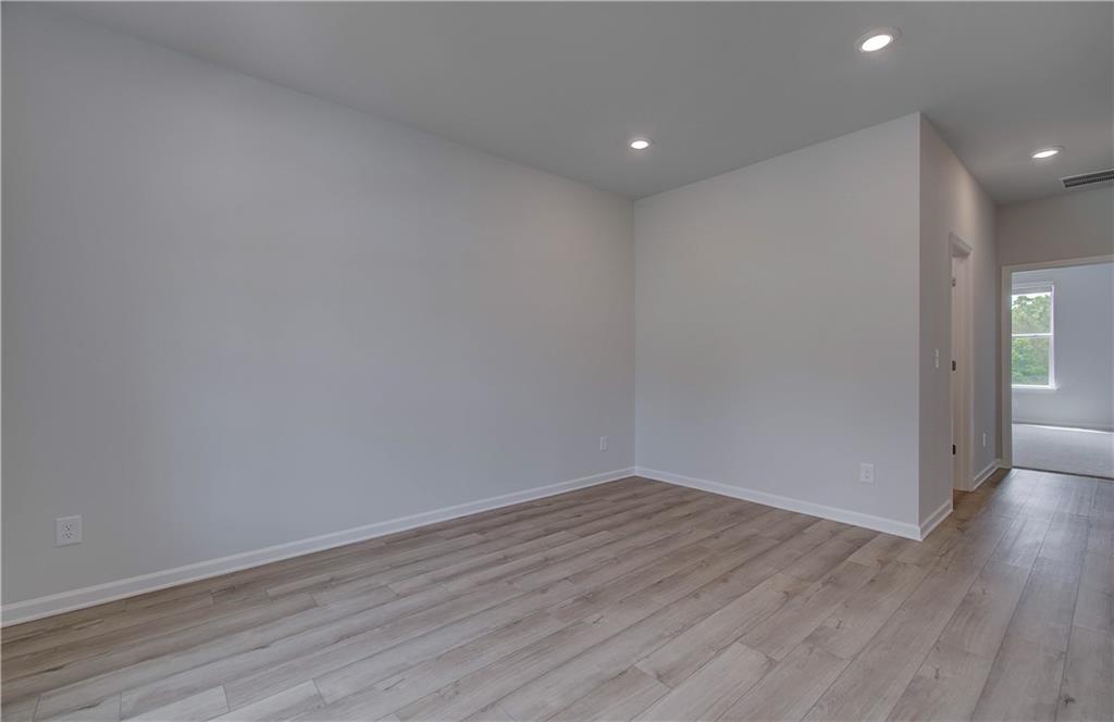 100 Felicity Pike Locust Grove, GA 30248 - Photo 6 of 38 a view of room with wooden floor