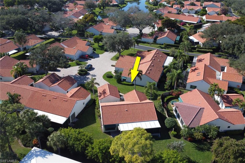 796 Reef Point Circle Naples, FL 34108 - Photo 30 of 37 an aerial view of residential houses with outdoor space and swimming pool