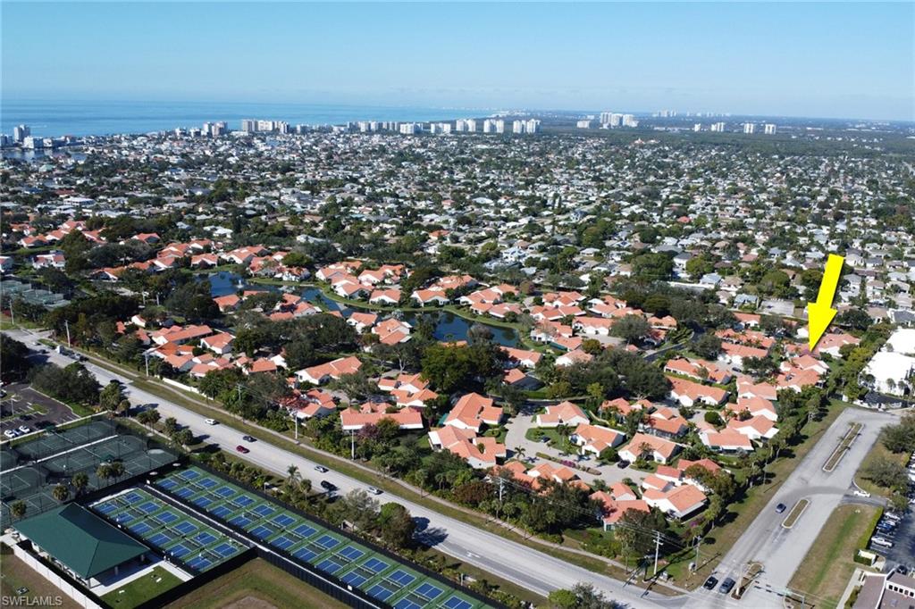 796 Reef Point Circle Naples, FL 34108 - Photo 33 of 37 an aerial view of a city