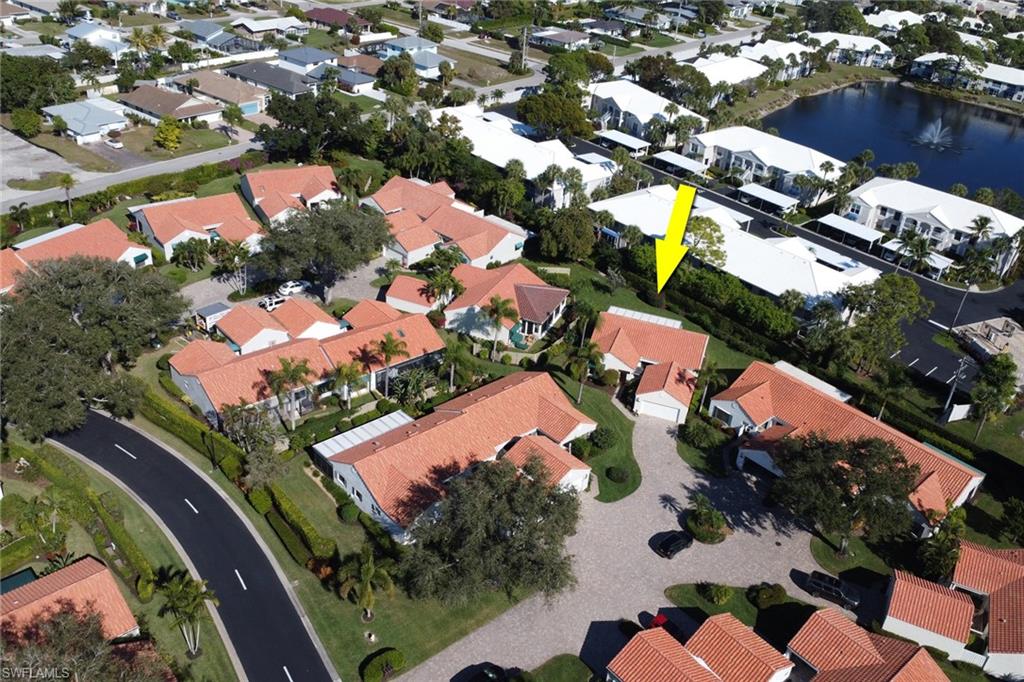 796 Reef Point Circle Naples, FL 34108 - Photo 36 of 37 an aerial view of residential houses with outdoor space