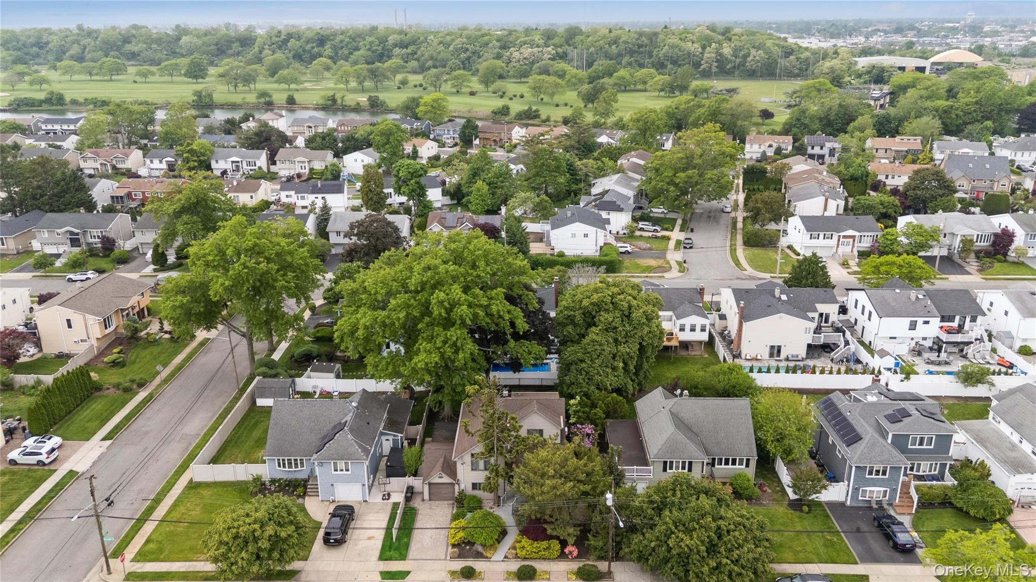 2772 Riverside Avenue Merrick, NY 11566 - Photo 34 of 45 an aerial view of a city with lots of residential buildings