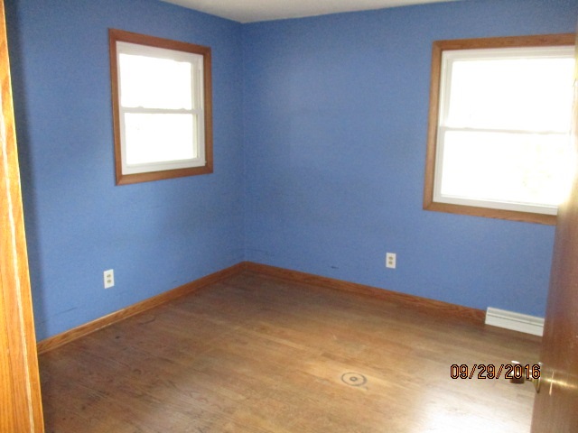 4965 Brigadoon Road Rockford, IL 61107 - Photo 11 of 13 an empty room with a window