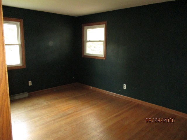 4965 Brigadoon Road Rockford, IL 61107 - Photo 12 of 13 a view of an empty room with a window
