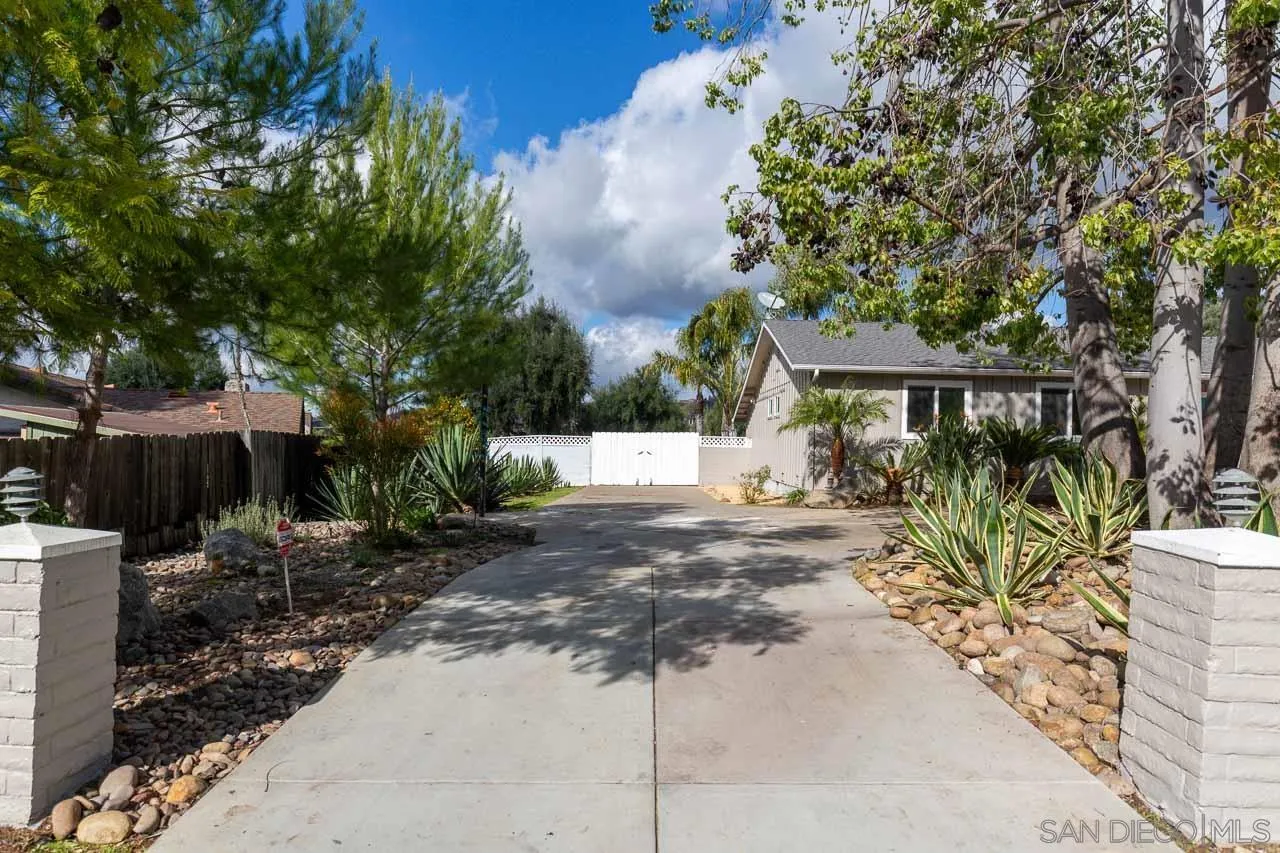 2922 Olive View Road Alpine, CA 91901 - Photo 2 of 34 a view of a yard with plants and trees