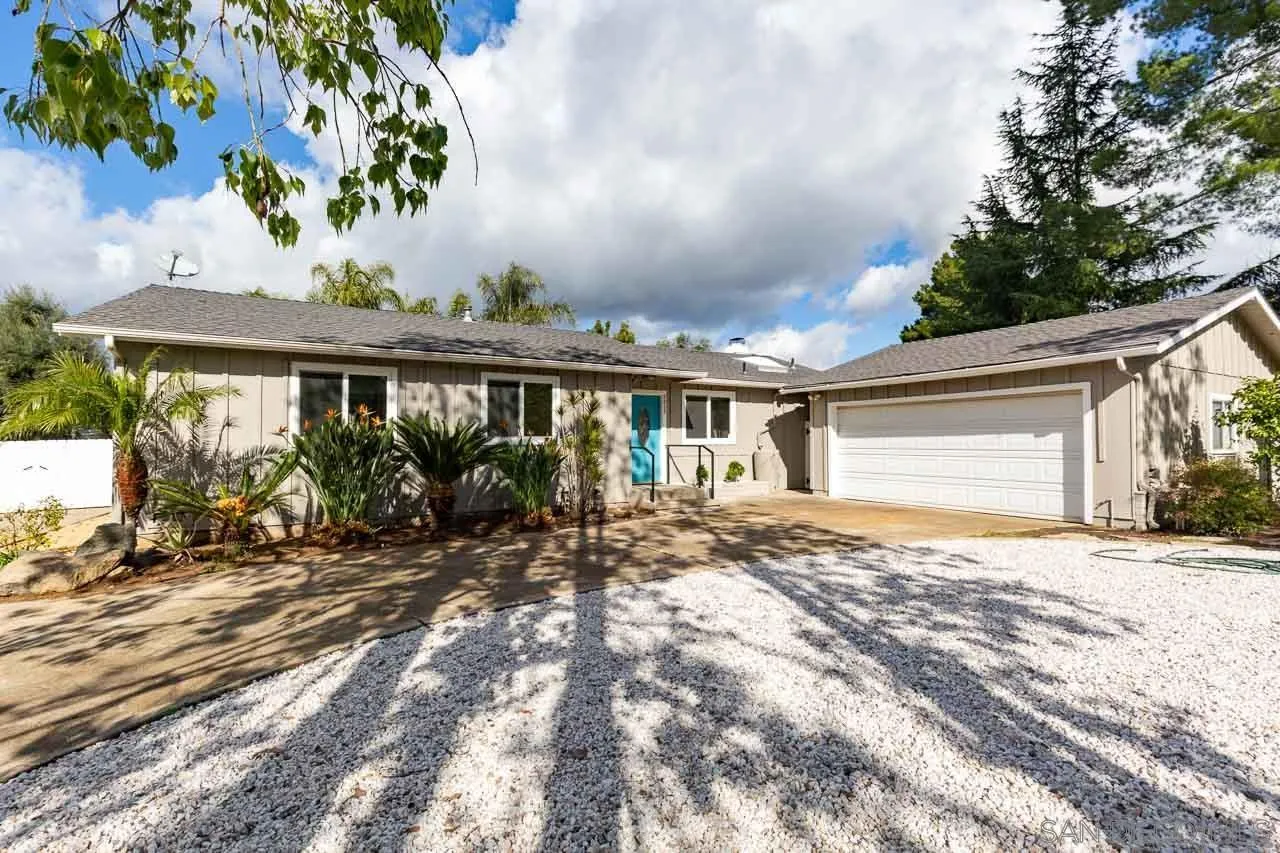 2922 Olive View Road Alpine, CA 91901 - Photo 32 of 34 a view of a house with a tree in the background