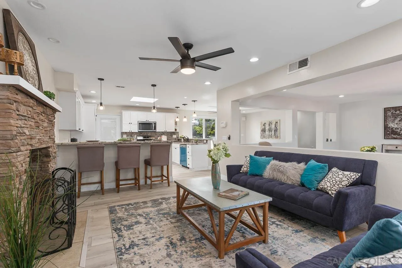 2922 Olive View Road Alpine, CA 91901 - Photo 4 of 34 a living room with fireplace furniture and a rug