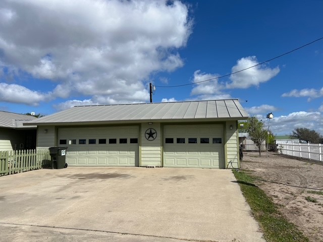 104 Jonathan Street Three Rivers, TX 78071 - Photo 11 of 17 a view of a building with a yard