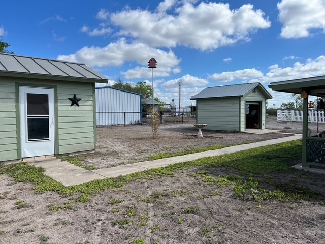 104 Jonathan Street Three Rivers, TX 78071 - Photo 17 of 17 a view of a house with a yard