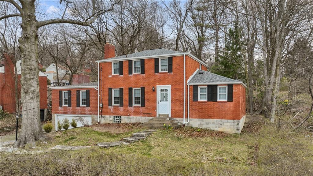116 Virginia Road Pittsburgh, PA 15237 - Photo 1 of 29 a front view of a house with a yard