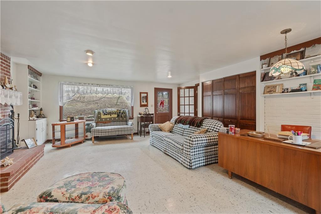 116 Virginia Road Pittsburgh, PA 15237 - Photo 11 of 29 a living room with furniture and a large window