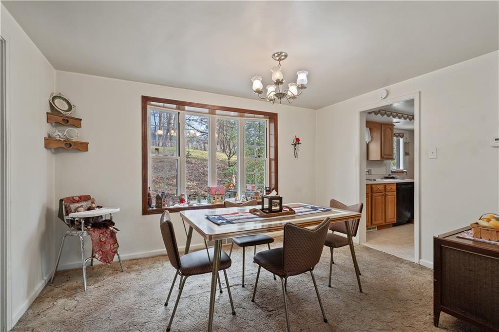 116 Virginia Road Pittsburgh, PA 15237 - Photo 6 of 29 a view of a dining room with furniture window and outside view