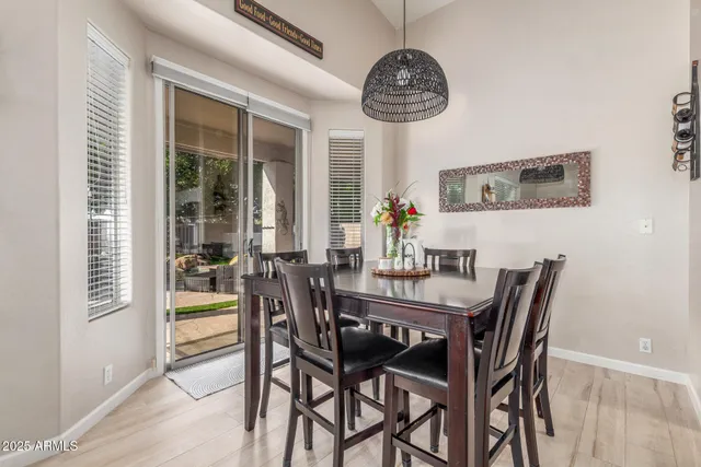 a kitchen with stainless steel appliances granite countertop a stove and cabinets