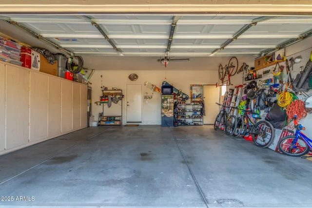 a view of a backyard with swimming pool