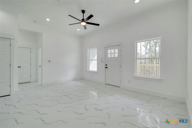 a view of livingroom with hardwood floor and window