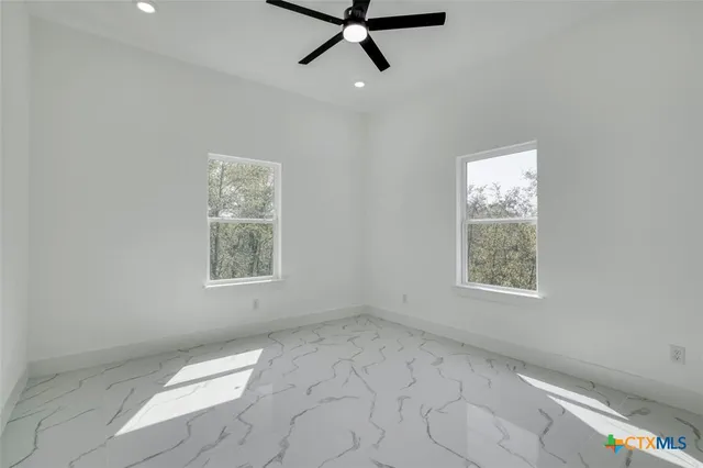 an empty room with windows