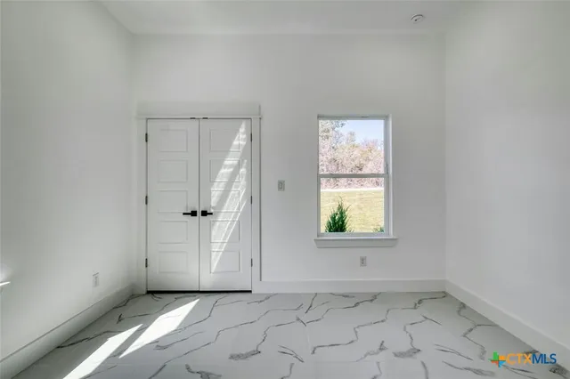 a bathroom with a sink a toilet and a tub