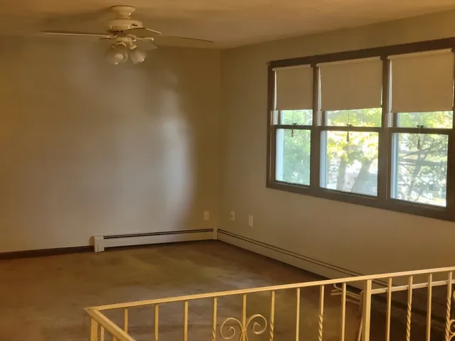 a view of a room with racks on the wall