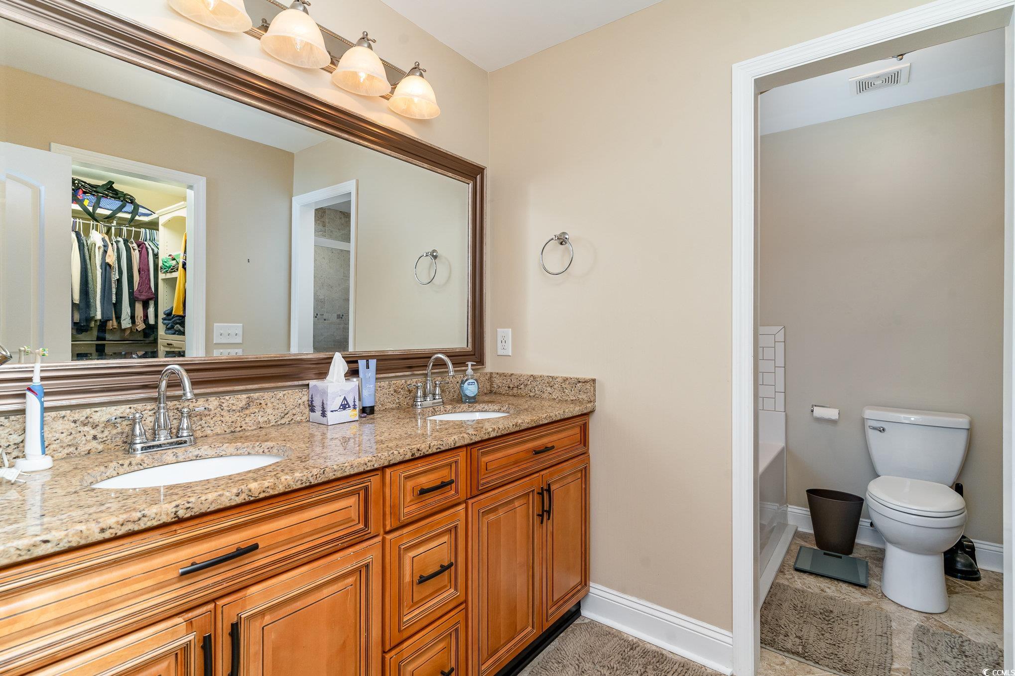 625 Seth Lane Longs, SC 29568 - Photo 14 of 34 Bathroom featuring tile patterned floors, toilet,
