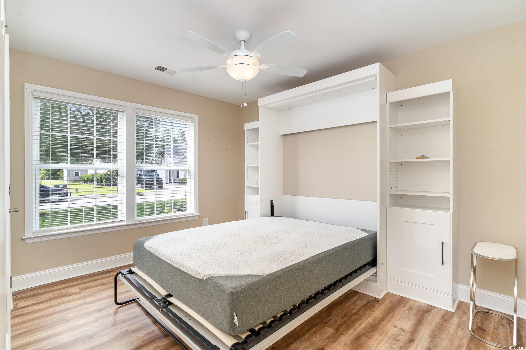 625 Seth Lane Longs, SC 29568 - Photo 17 of 34 Bedroom with multiple windows, hardwood / wood-sty