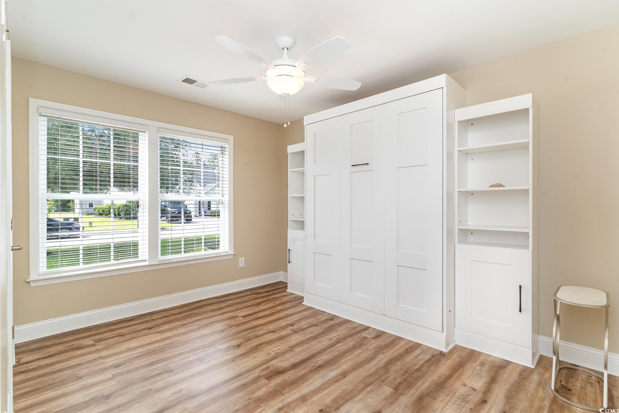 625 Seth Lane Longs, SC 29568 - Photo 18 of 34 Unfurnished bedroom featuring a closet, light wood