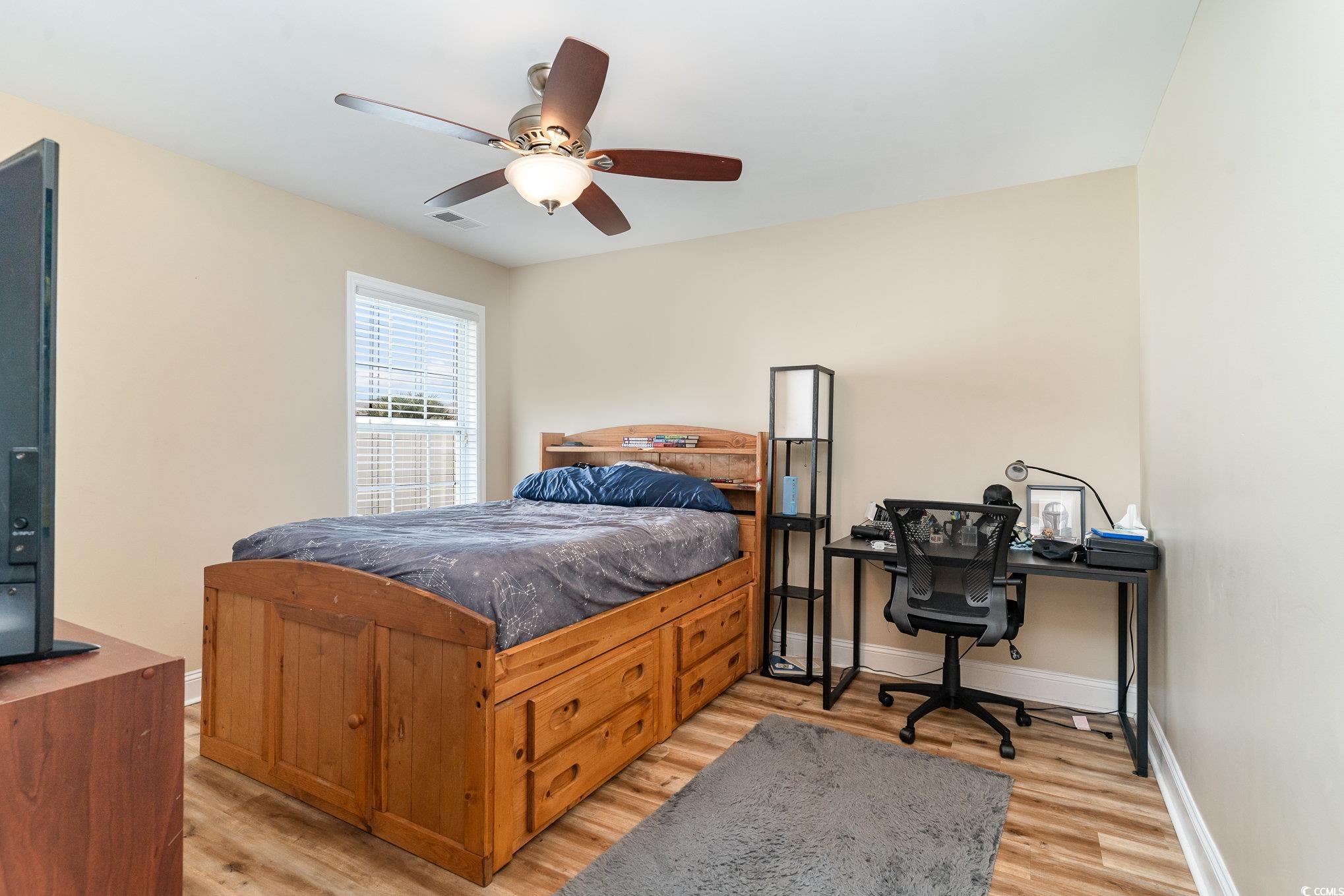 625 Seth Lane Longs, SC 29568 - Photo 19 of 34 Bedroom with light hardwood / wood-style flooring