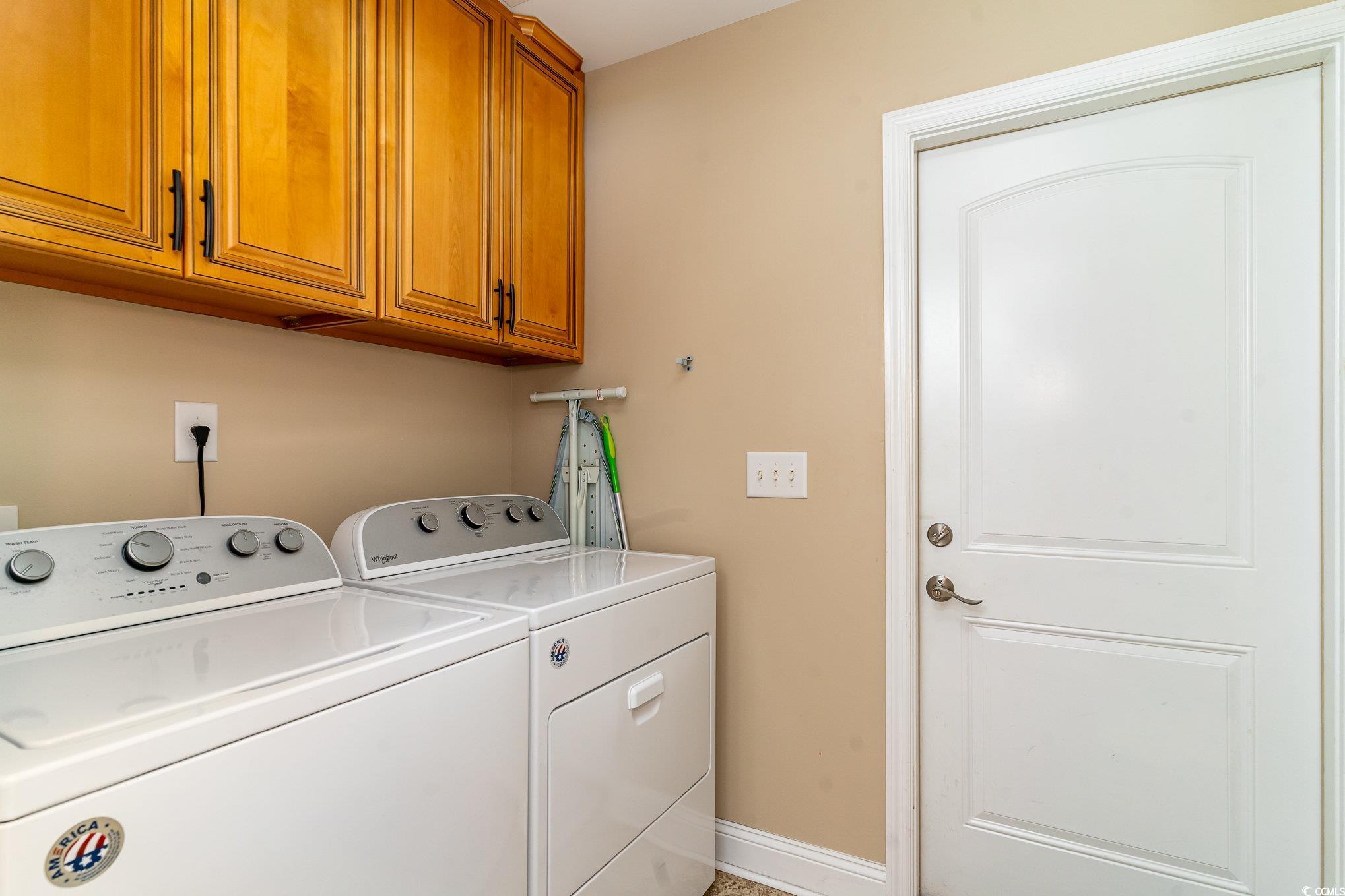 625 Seth Lane Longs, SC 29568 - Photo 22 of 34 Washroom with cabinets and independent washer and