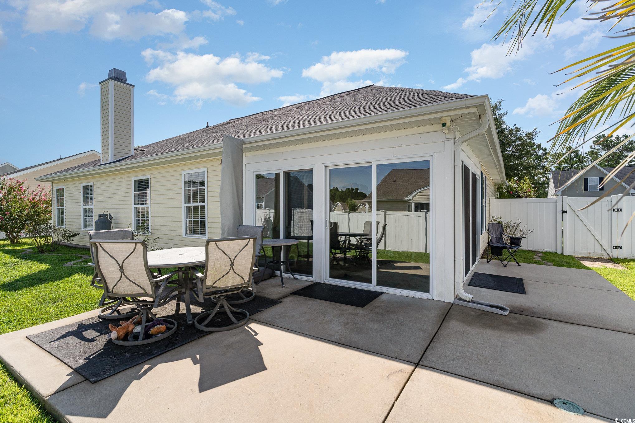 625 Seth Lane Longs, SC 29568 - Photo 25 of 34 Rear view of property featuring a patio area