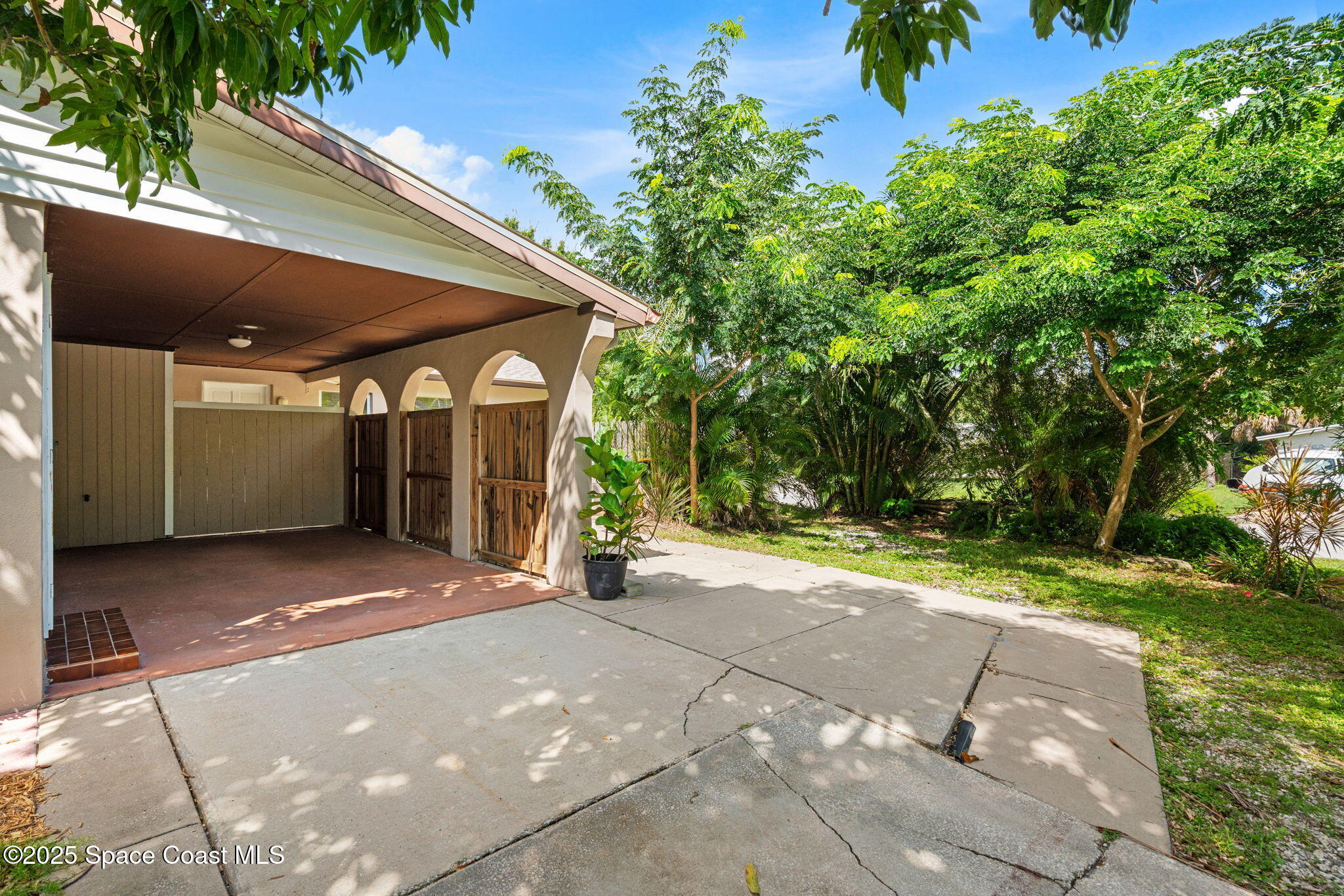 2902 Emory Street Melbourne, FL 32901 - Photo 23 of 46 a view of a car garage