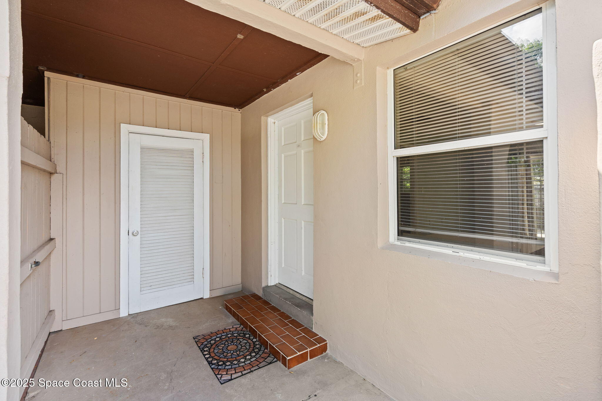 2902 Emory Street Melbourne, FL 32901 - Photo 31 of 46 a view of an entryway door