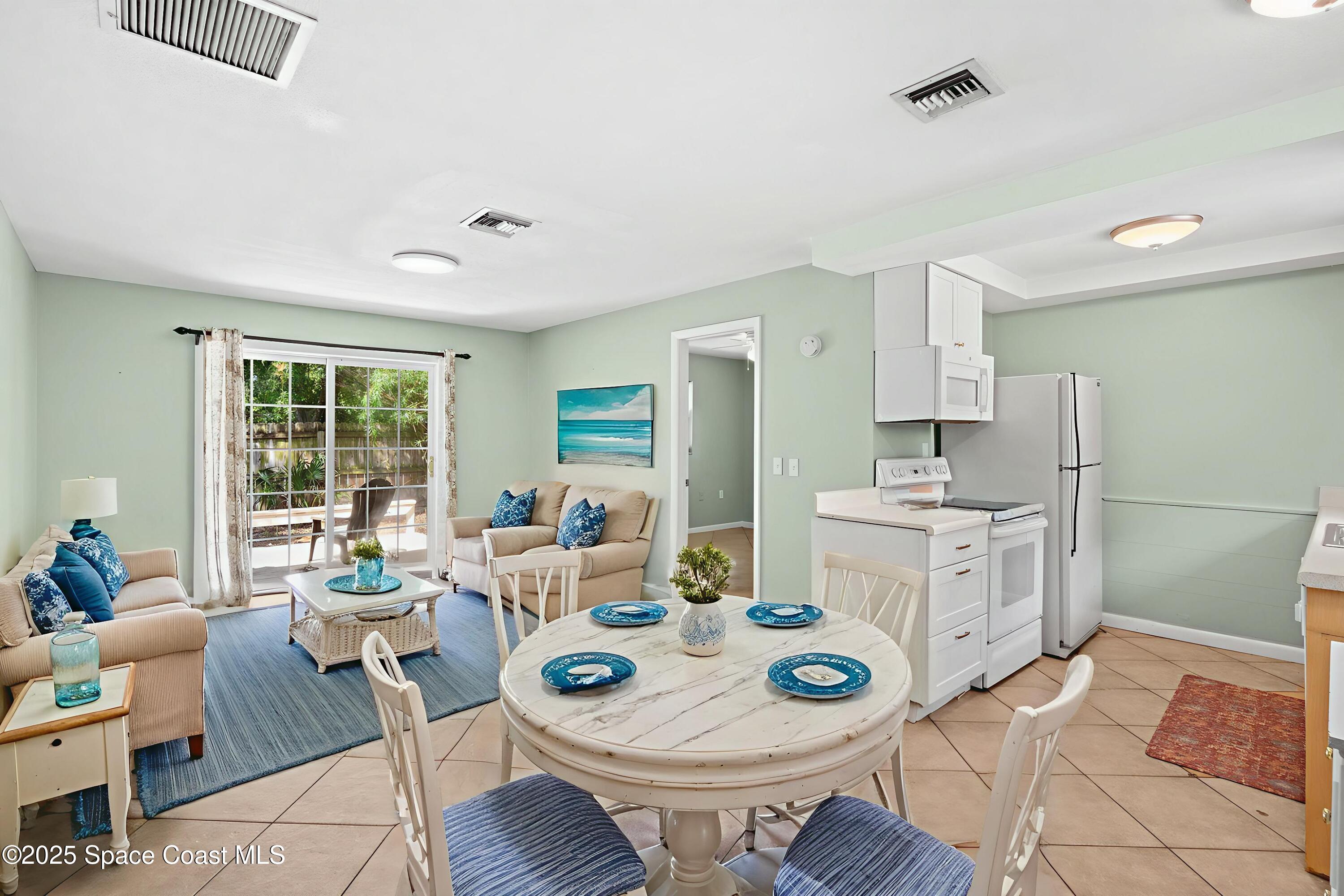 2902 Emory Street Melbourne, FL 32901 - Photo 35 of 46 a very nice looking dining room with a table and chairs