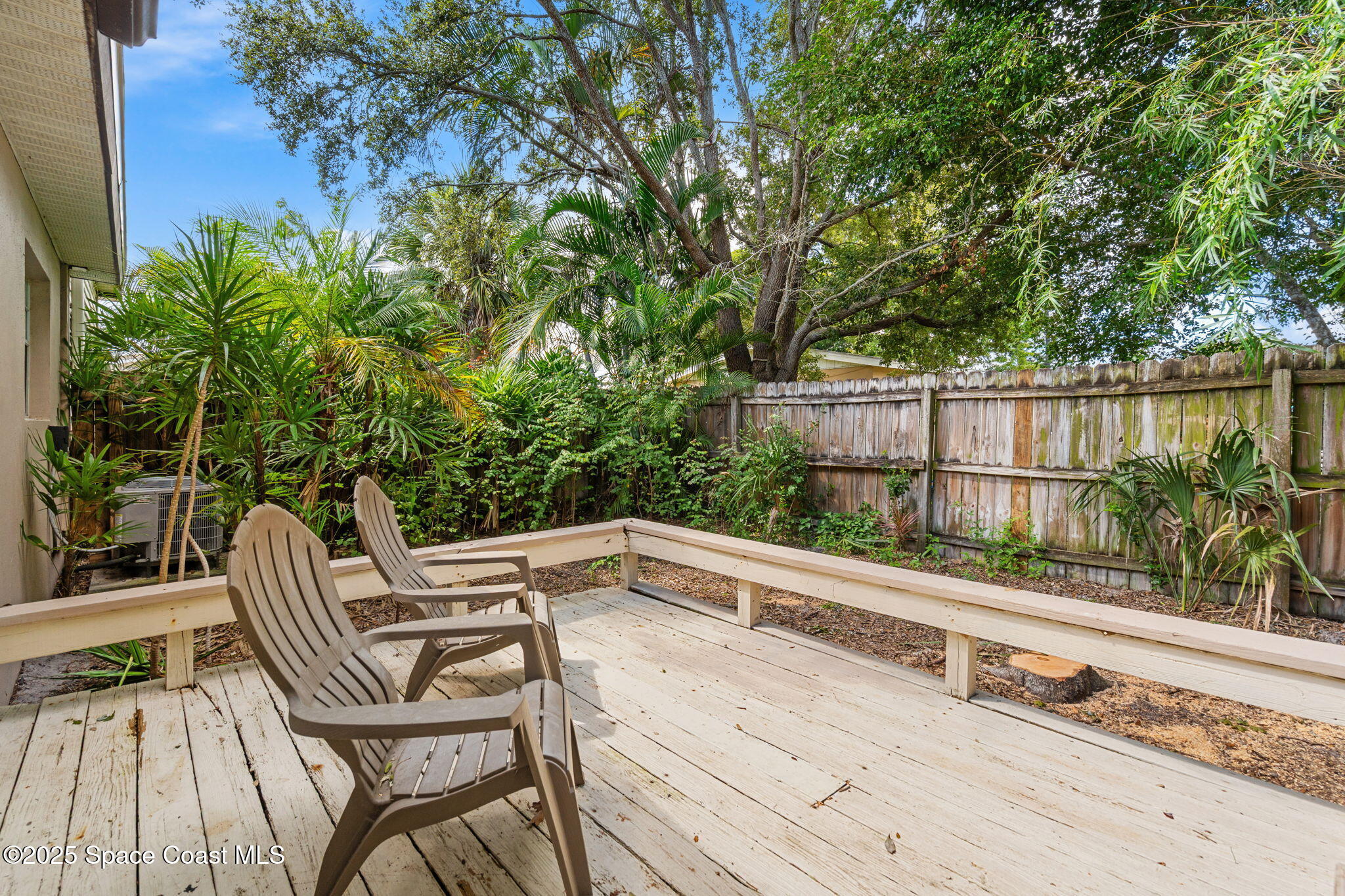 2902 Emory Street Melbourne, FL 32901 - Photo 43 of 46 a view of balcony with two chairs and a table
