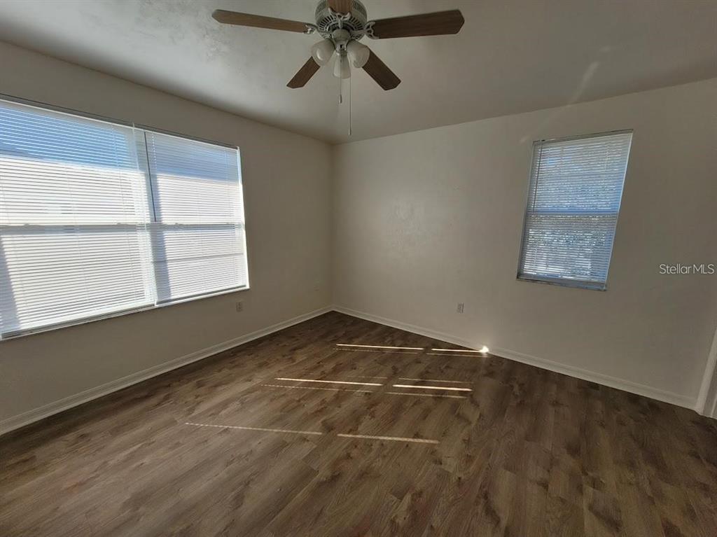 3890 Southwest 20th Avenue, Unit 1712 Gainesville, FL 32607 - Photo 9 of 19 a view of an empty room with a window
