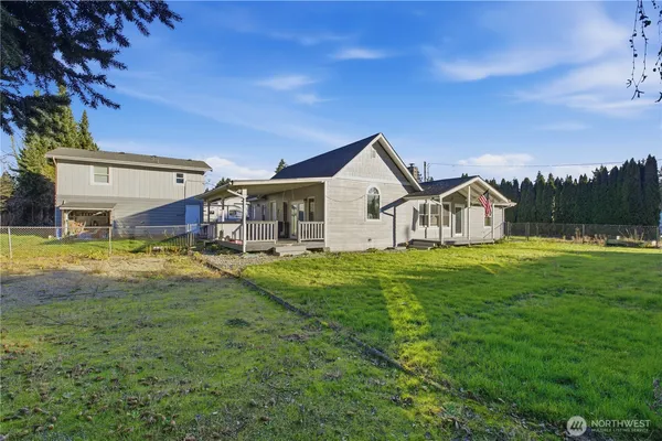 a view of a house with a big yard