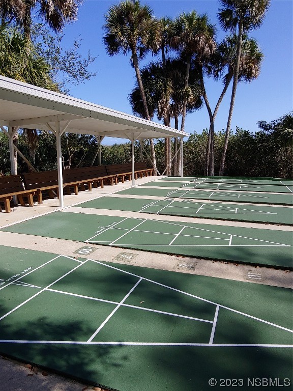 502 Topside Circle Edgewater, FL 32141 - Photo 22 of 28 a view of a tennis ground with a large pool