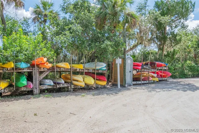 a view of a swimming pool with a porch