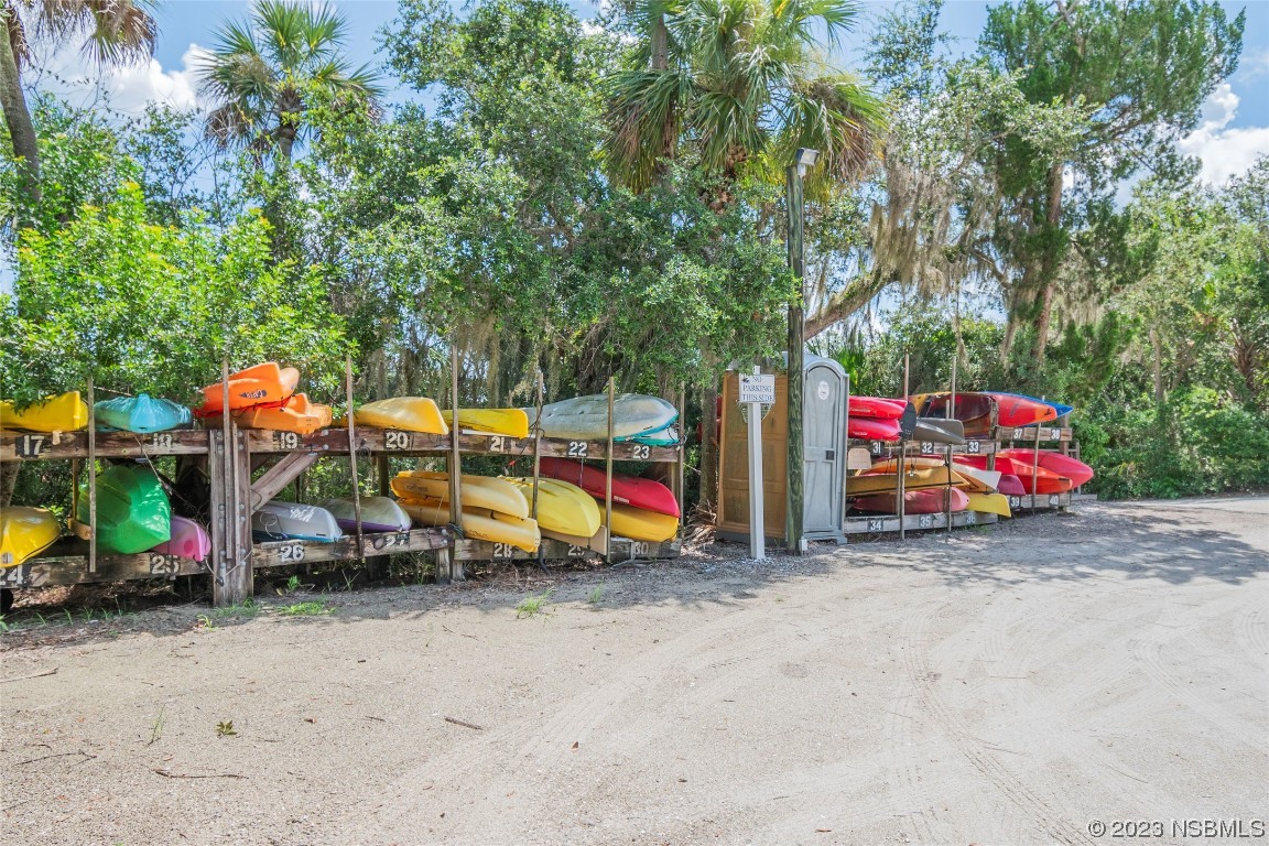 502 Topside Circle Edgewater, FL 32141 - Photo 23 of 28 a view of outdoor space with garden and entertaining space