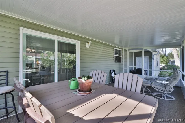 a view of a patio with a chairs