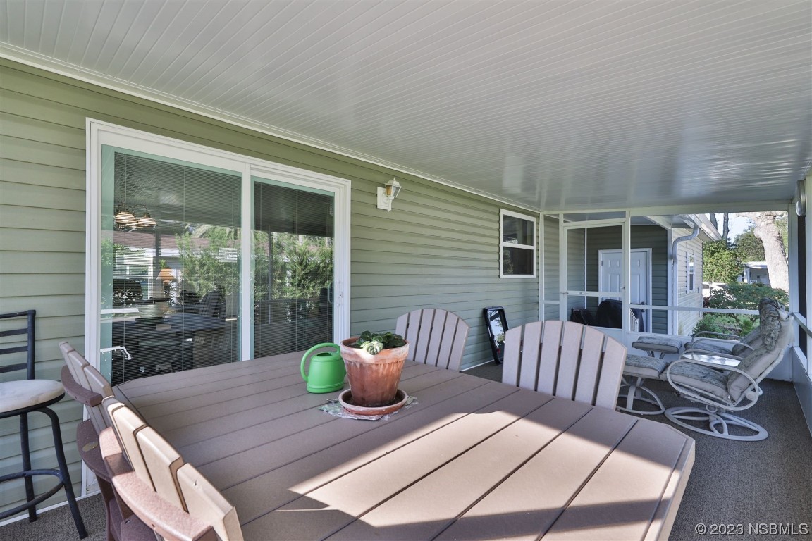 502 Topside Circle Edgewater, FL 32141 - Photo 5 of 28 a view of a patio with a chairs