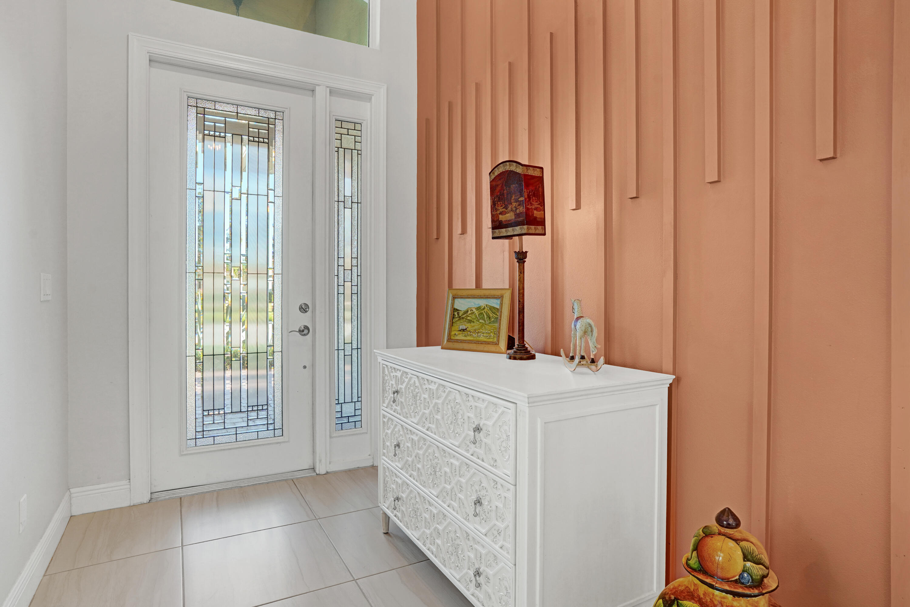 23005 Southwest Accesi Way Port St. Lucie, FL 34986 - Photo 13 of 80 a bathroom with a sink and a mirror