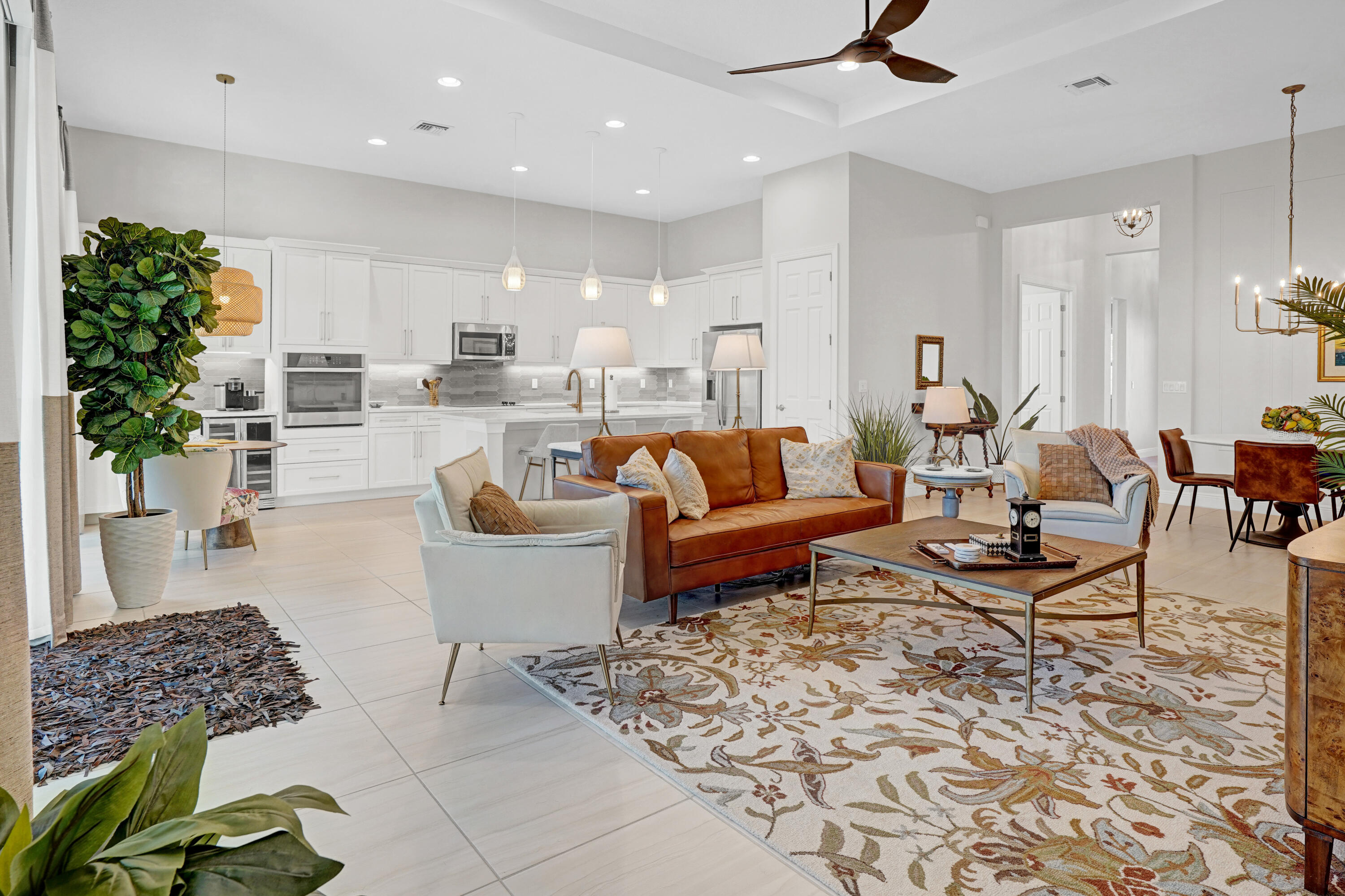 23005 Southwest Accesi Way Port St. Lucie, FL 34986 - Photo 19 of 80 a living room with furniture and a potted plant