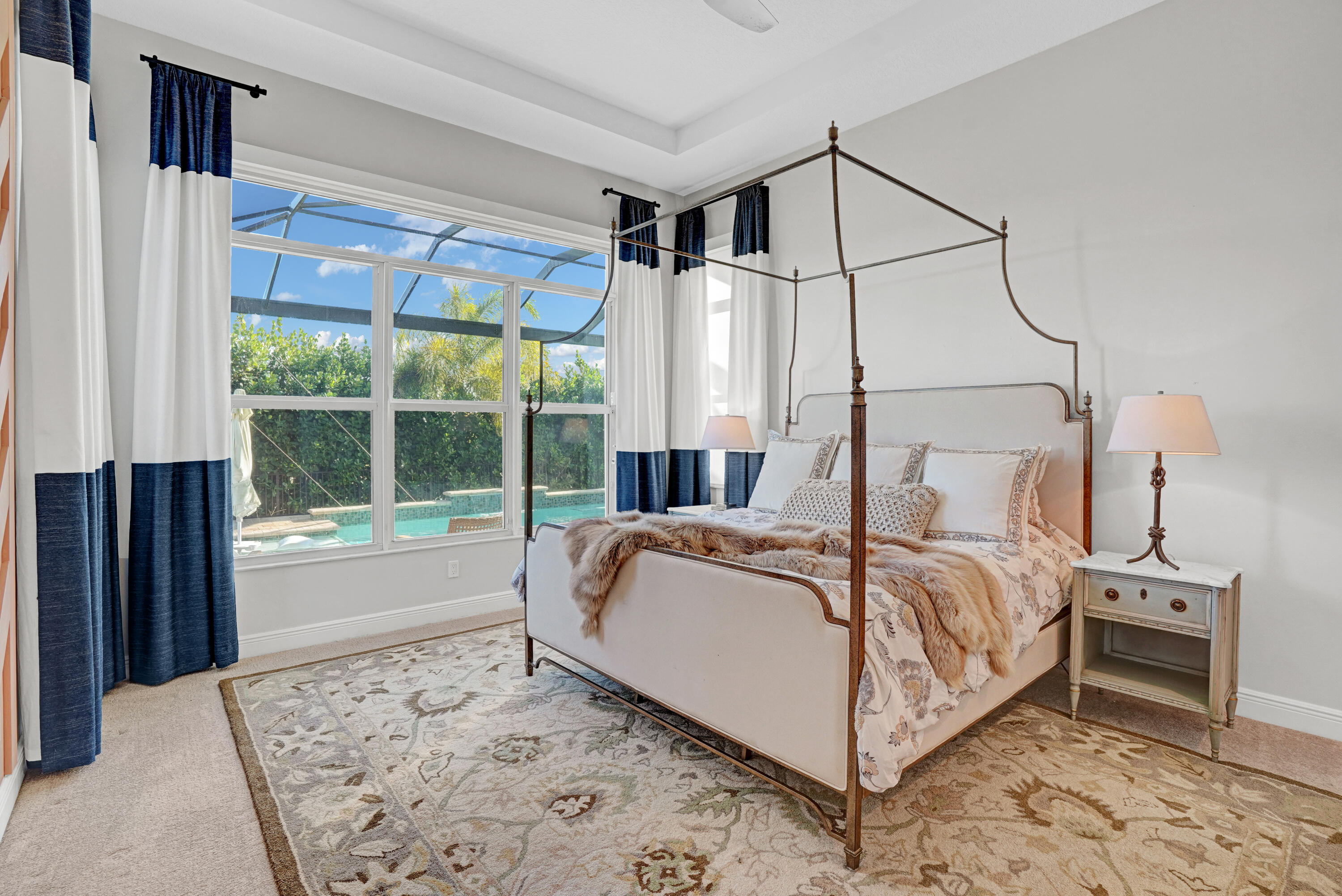 23005 Southwest Accesi Way Port St. Lucie, FL 34986 - Photo 27 of 80 a bedroom with a bed and a window