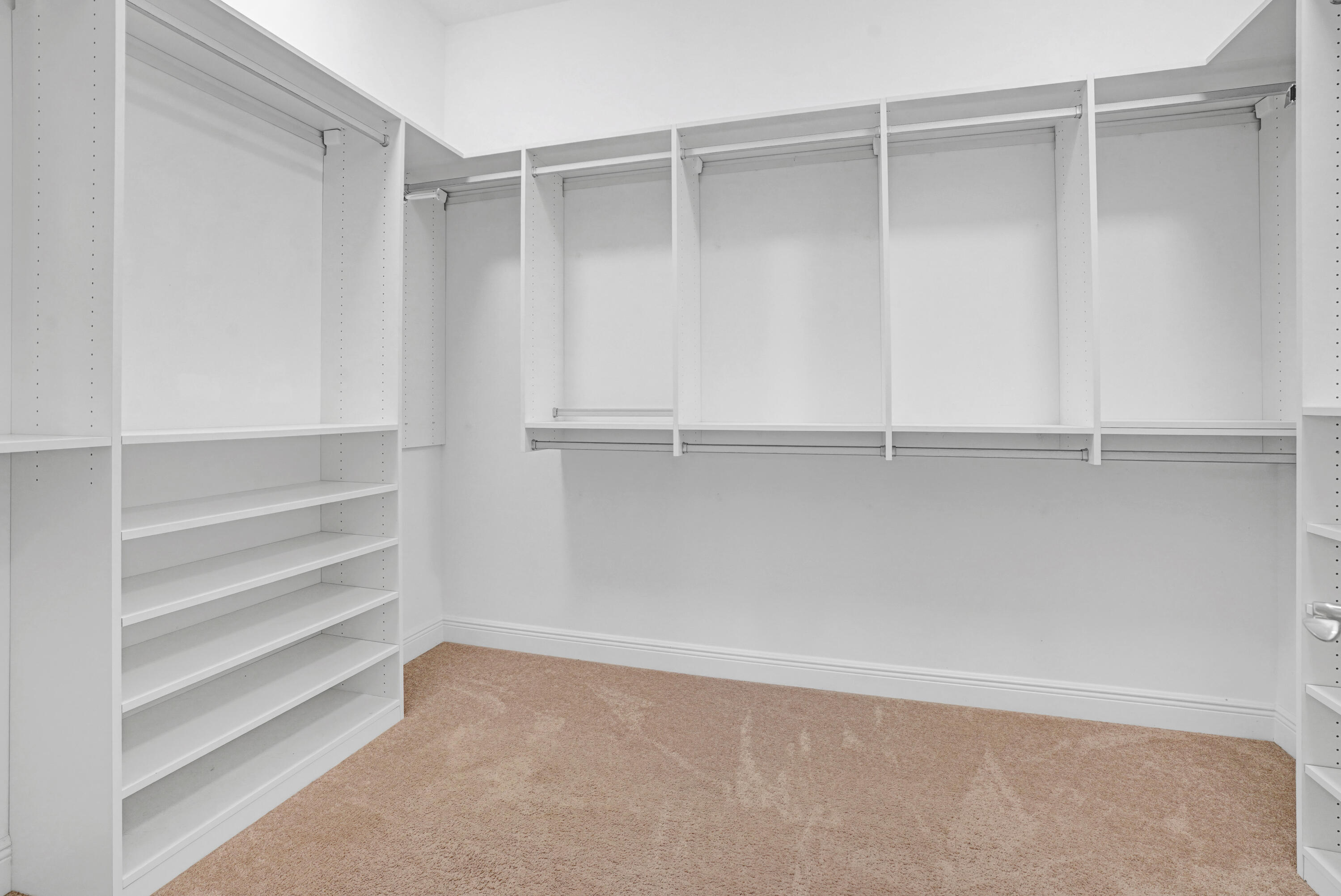 23005 Southwest Accesi Way Port St. Lucie, FL 34986 - Photo 29 of 80 a view of an empty walk in closet