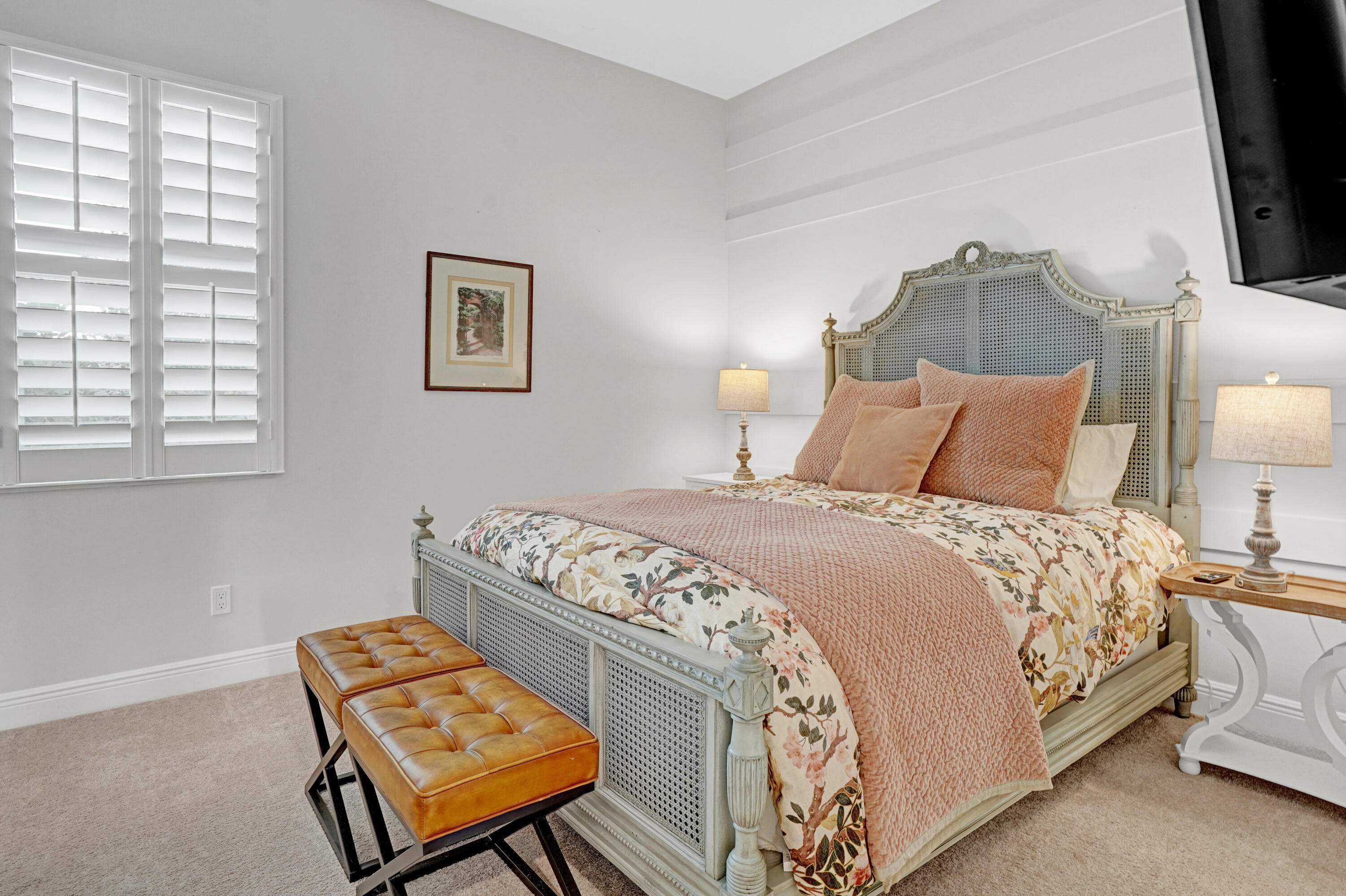 23005 Southwest Accesi Way Port St. Lucie, FL 34986 - Photo 32 of 80 a bedroom with a bed and a lamp on dresser