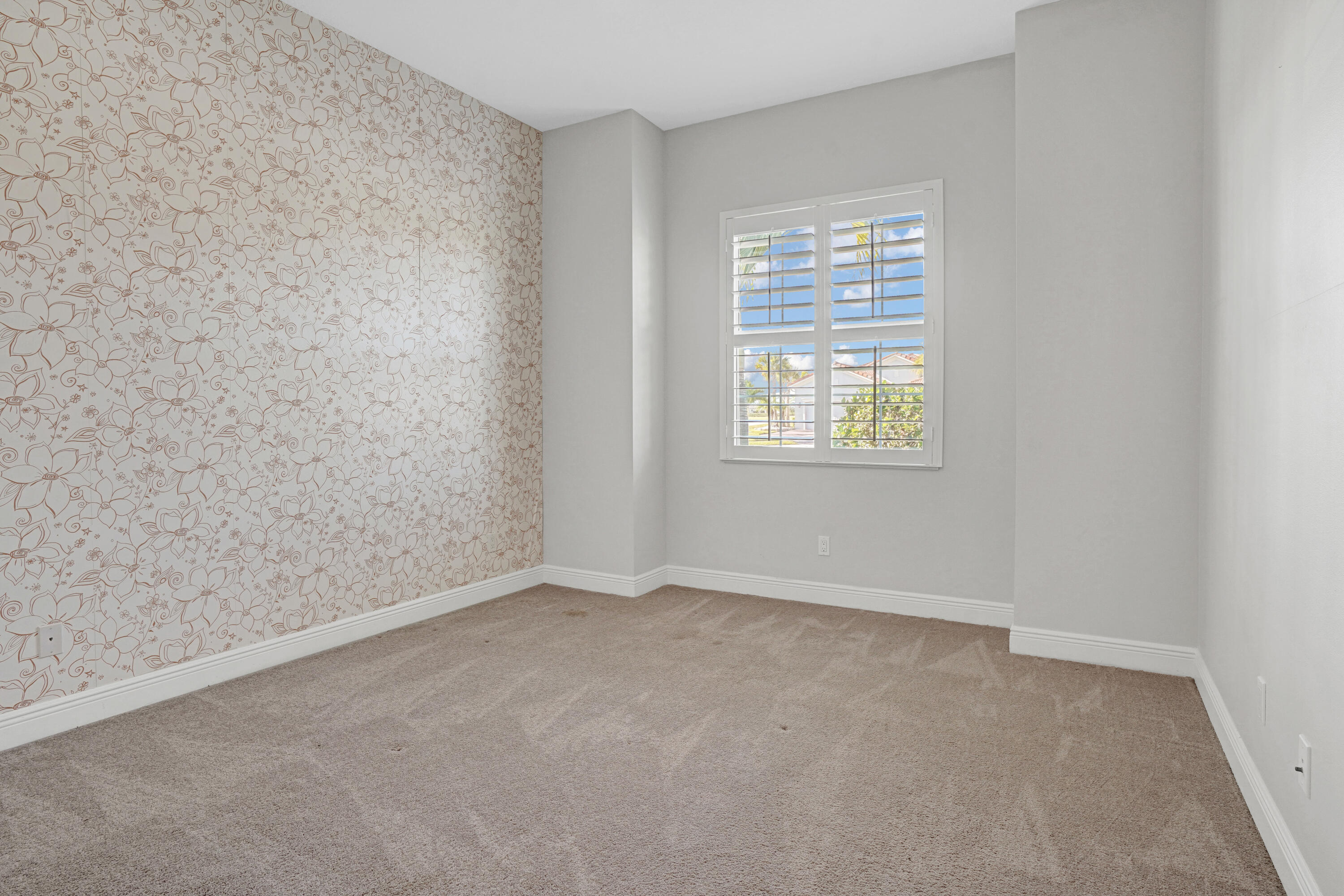 23005 Southwest Accesi Way Port St. Lucie, FL 34986 - Photo 36 of 80 an empty room with a window