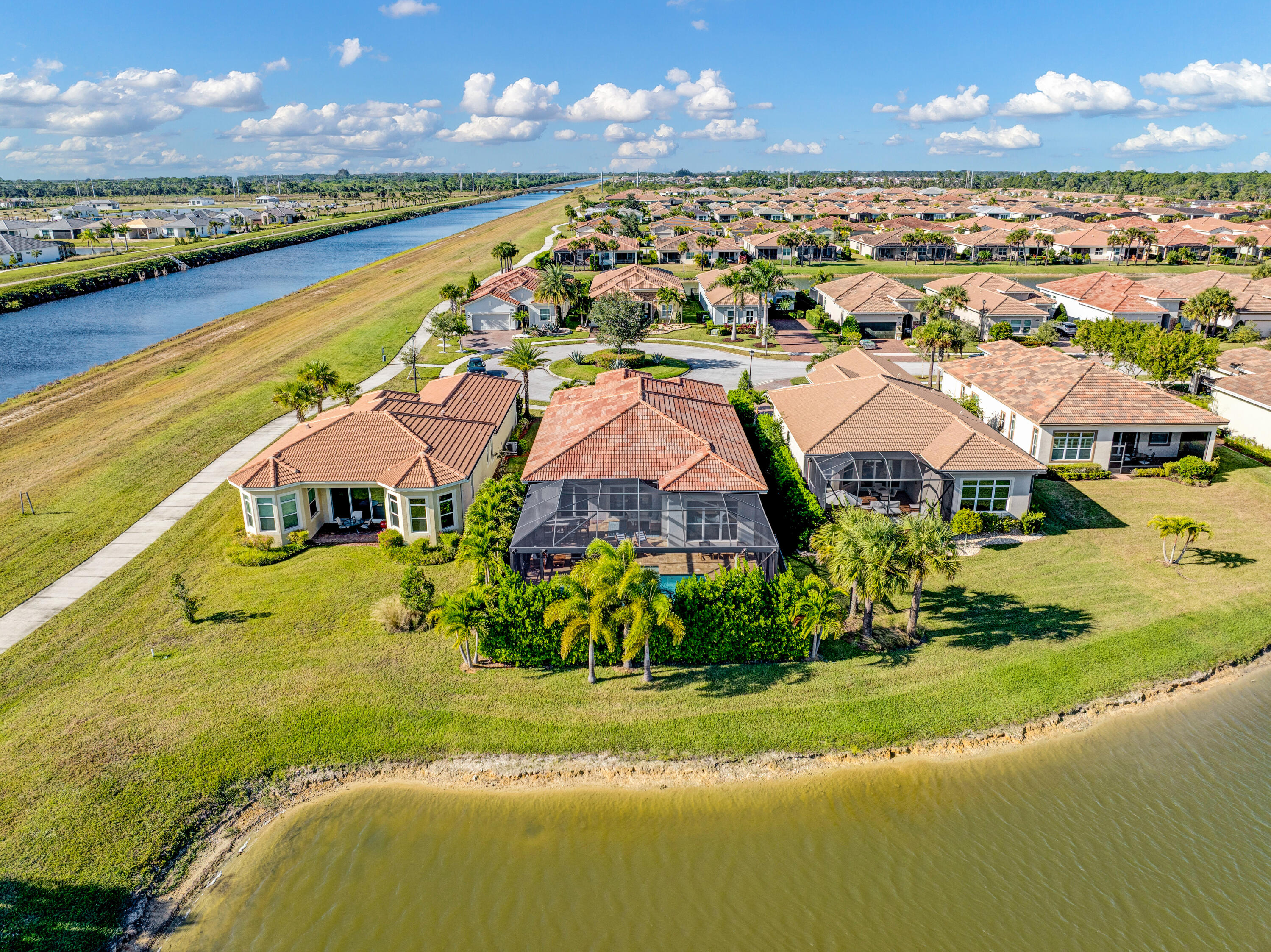 23005 Southwest Accesi Way Port St. Lucie, FL 34986 - Photo 5 of 80 a view of a city with lawn chairs