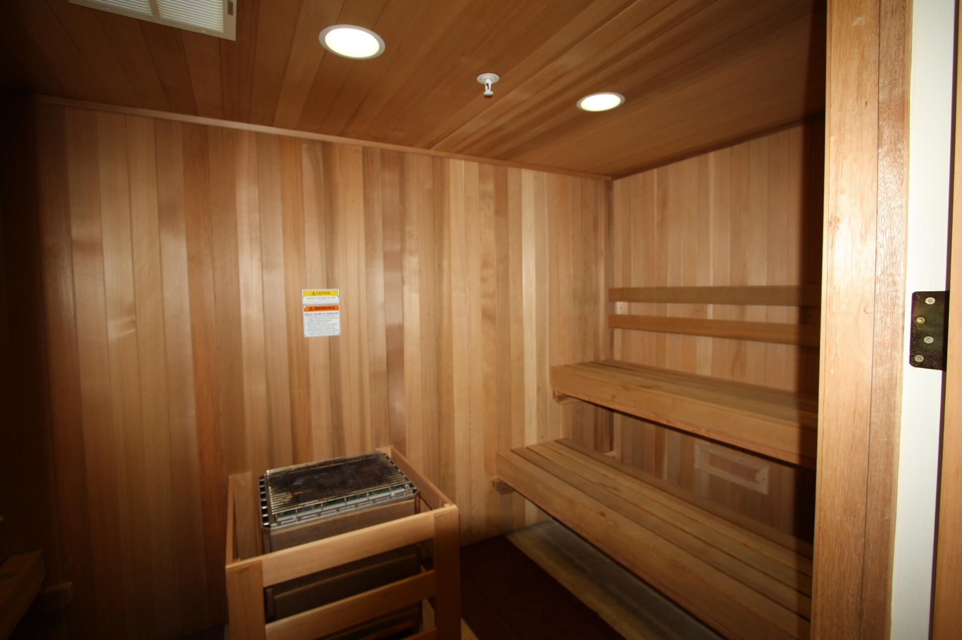 23005 Southwest Accesi Way Port St. Lucie, FL 34986 - Photo 70 of 80 a view of a room with racks on the wall