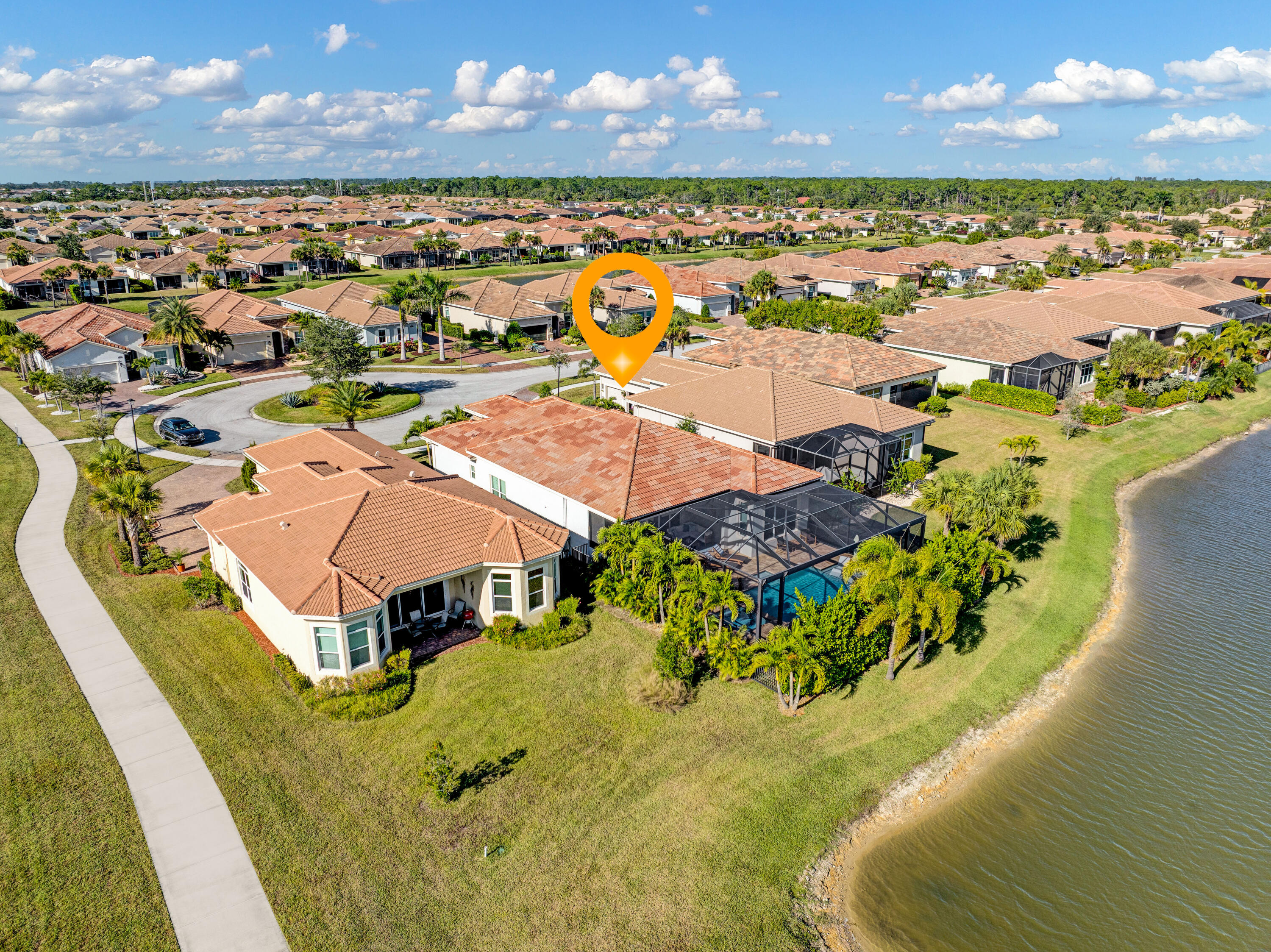 23005 Southwest Accesi Way Port St. Lucie, FL 34986 - Photo 10 of 80 an aerial view of residential houses with outdoor space