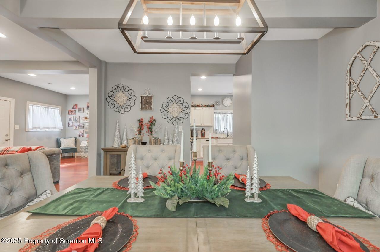 1531 Electric Street Dunmore, PA 18509 - Photo 15 of 56 a living room with furniture and flowers
