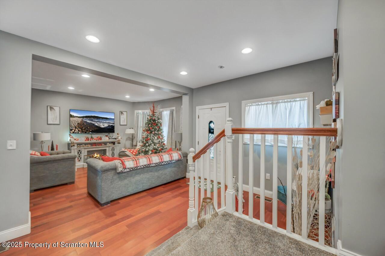 1531 Electric Street Dunmore, PA 18509 - Photo 25 of 56 a living room with fireplace furniture and a flat screen tv
